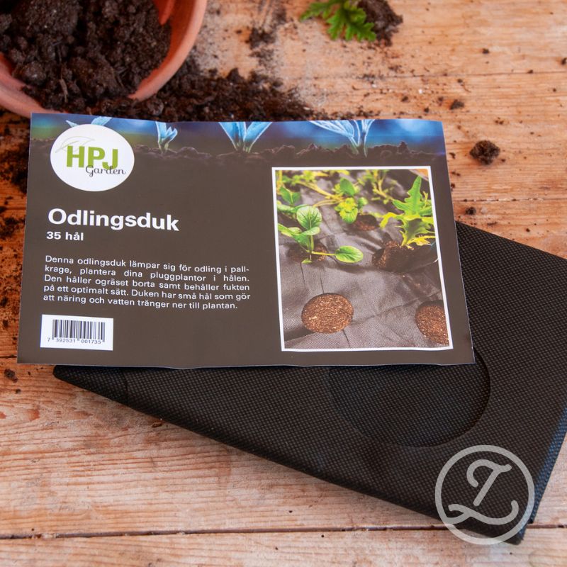 Odlingsduk med planteringshål